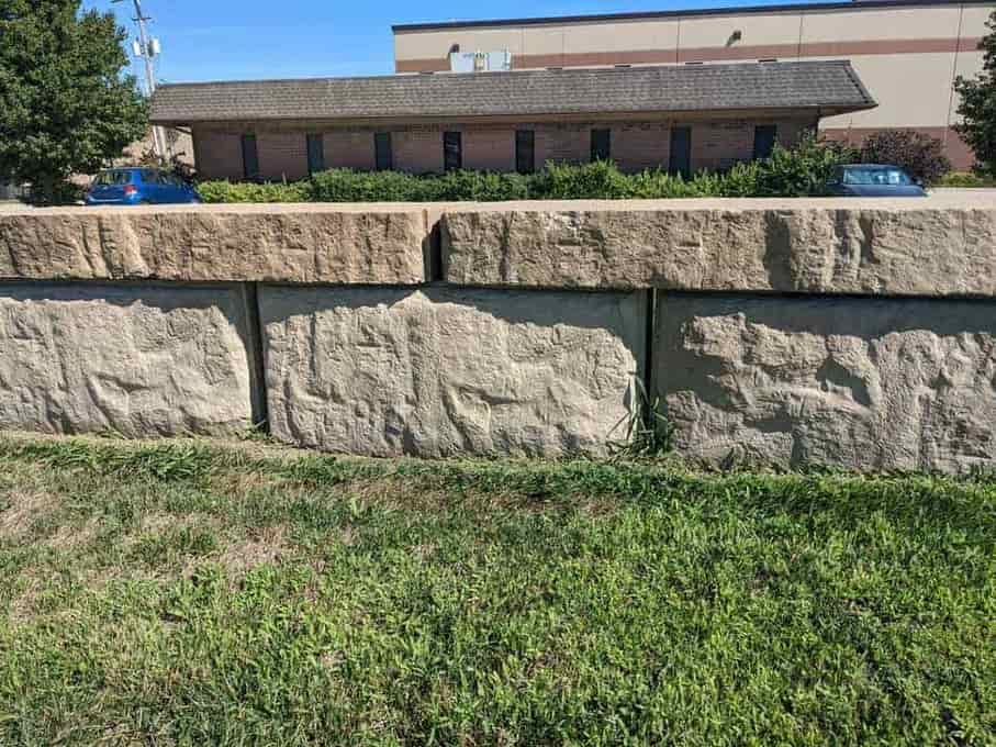 Concrete block retaining wall installation